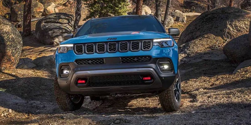 Jeep Compass Trailhawk navigating rocky off-road terrain